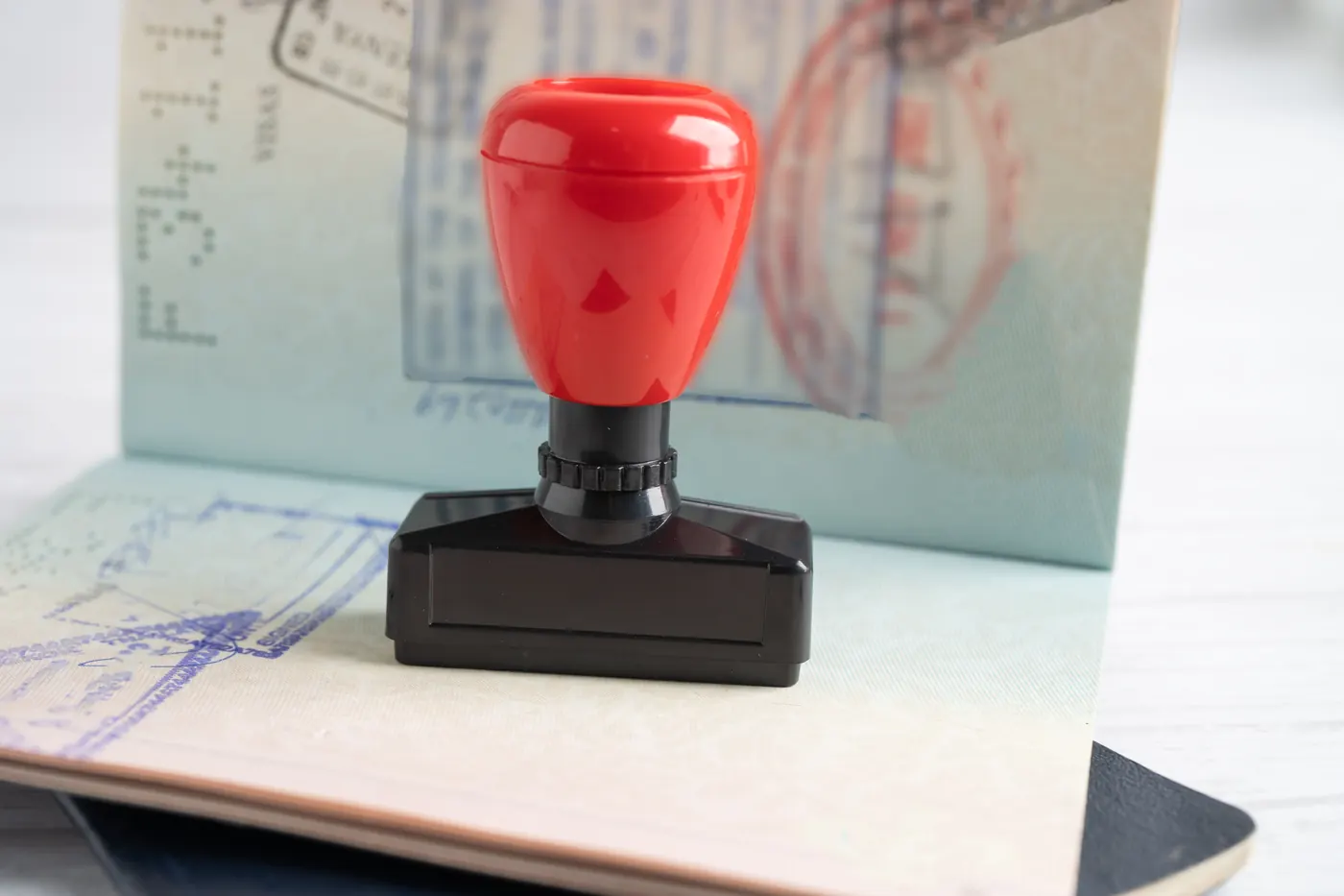 Approved Stamp visa and passport document to immigration at airport in country