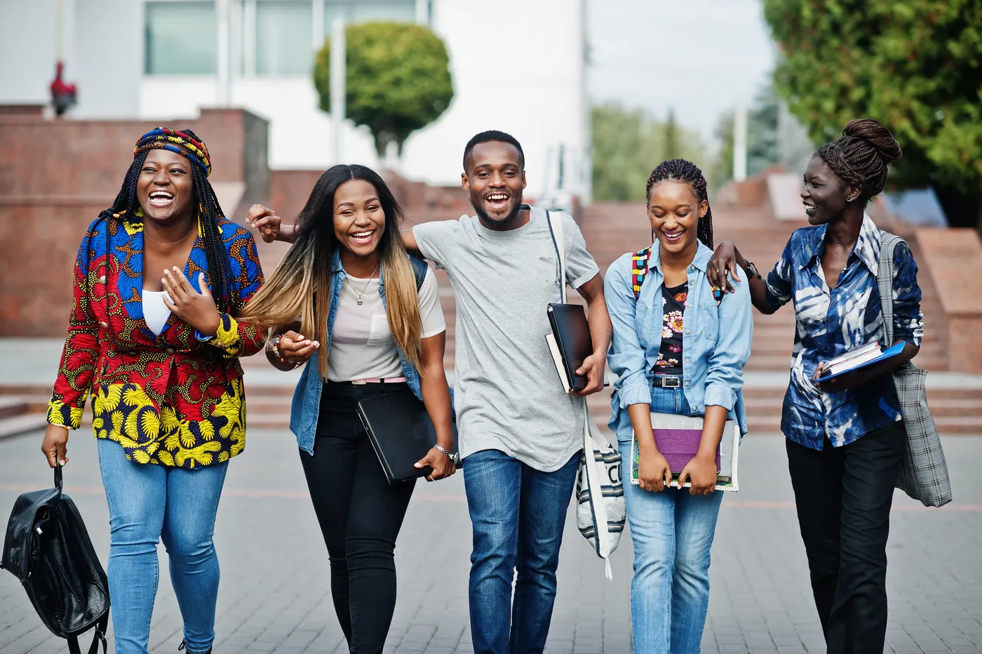 Group of five african college students together on campus
